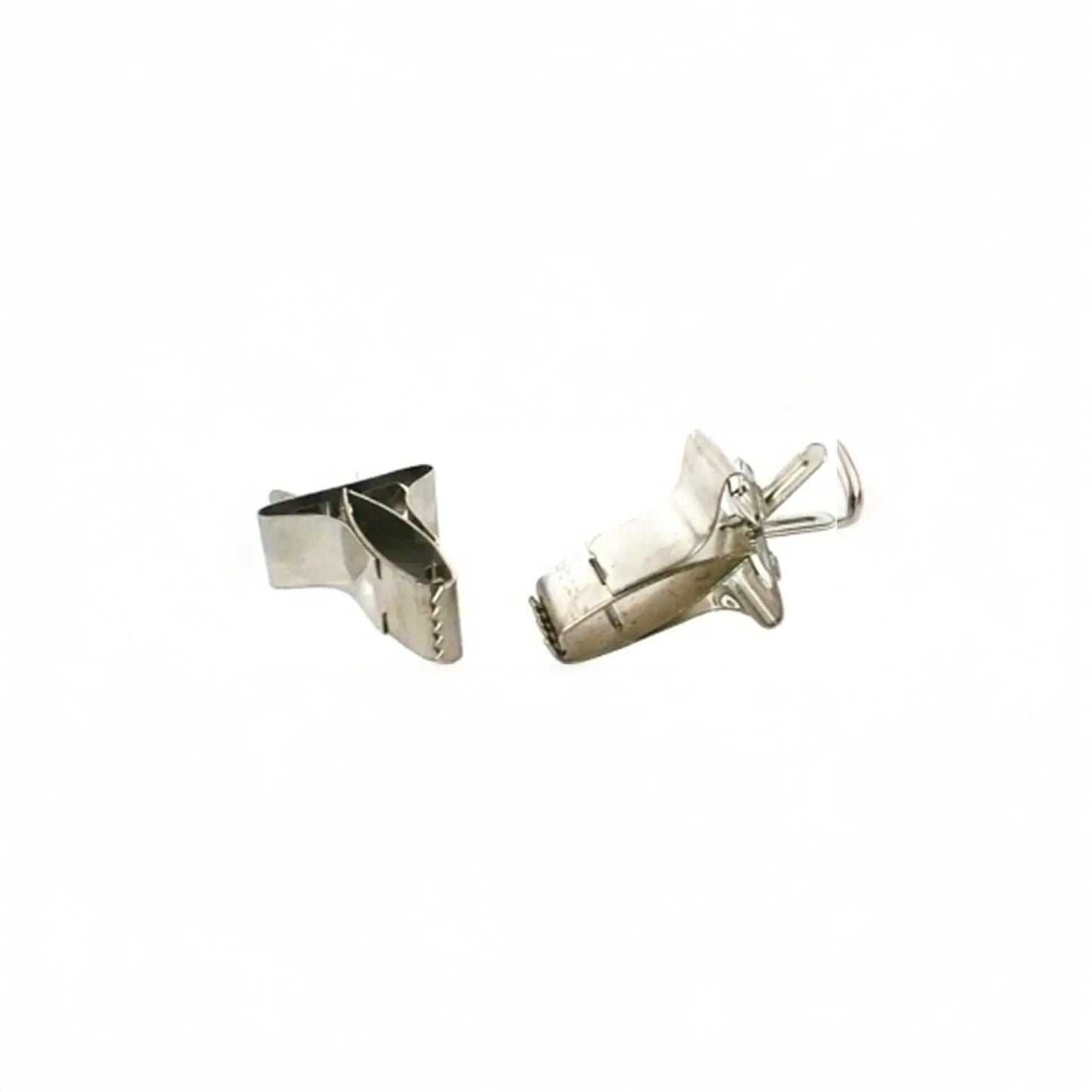 Handy PSI Griptite Food and Treat Clip holding cuttlebones and greens securely inside a small pet cage for easy feeding.