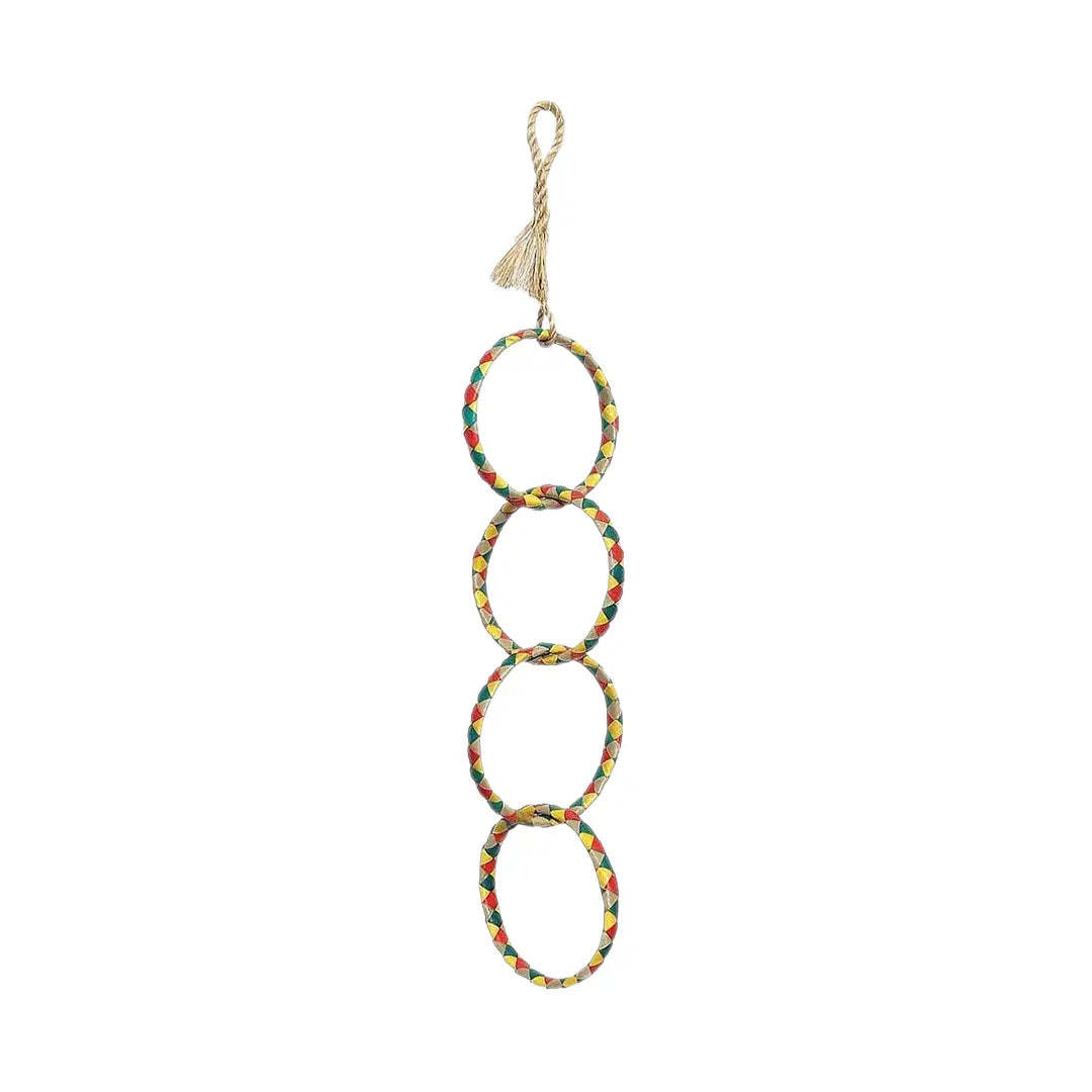Colorful bird toy with four layered palm leaf rings, perfect as a swing for small birds or a chew toy for larger ones.