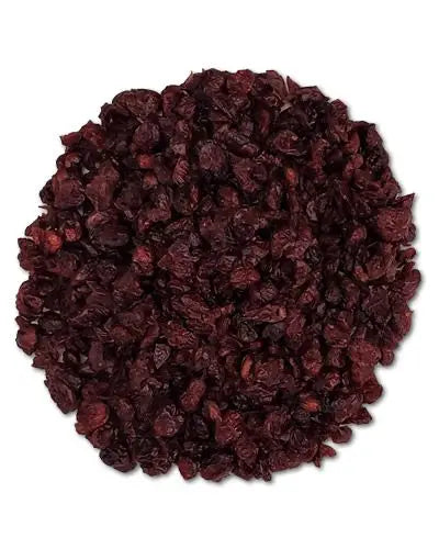 Vibrant red dried cranberries in a pile, perfect as a tasty, healthy treat for birds or a foraging snack.
