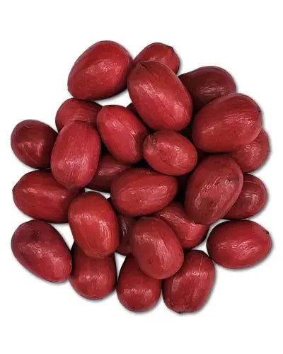 Fresh pecans in their natural shell, perfect for foraging toys or snacking, showcasing their rough, brown exterior.