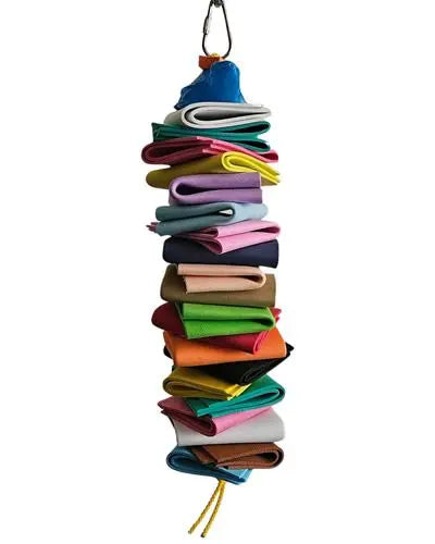 Vibrant multi-colored foam squares stacked creatively with a playful plastic toy on top, perfect for medium-sized birds.