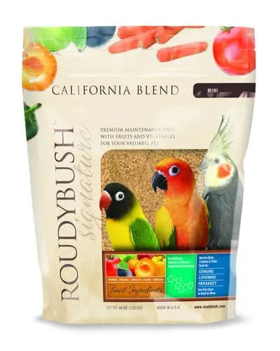 Vibrant mix of Roudybush Maintenance California Blend Mini with colorful dried fruits and veggies for pet birds.