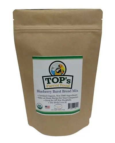 Freshly prepared Blueberry Burst Bread Mix by TOP's, showcasing a vibrant 1.35lb bag of organic, bird-friendly ingredients.