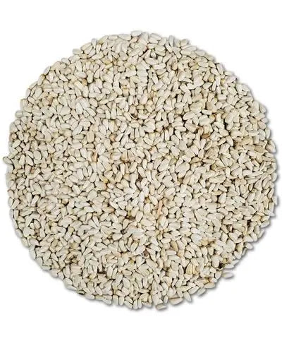 Vibrant pile of golden safflower seeds, packed with protein and energy for wild birds, in a 20lb bulk bag.
