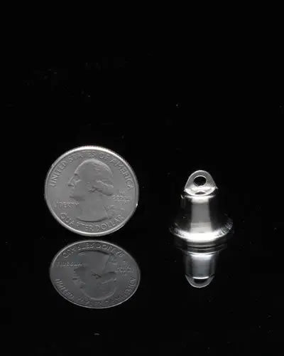 Charming extra small nickel-plated Liberty Bell bird toy part, measuring 5/8" in height and diameter, with a shiny finish.