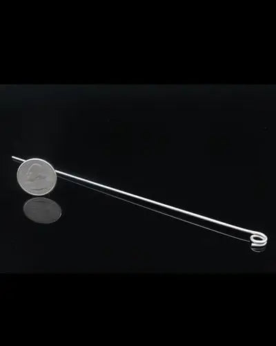 Sleek 7.25-inch straight wire with a 1/4-inch eye hole at one end, featuring a slim 1/16-inch diameter for versatile use.