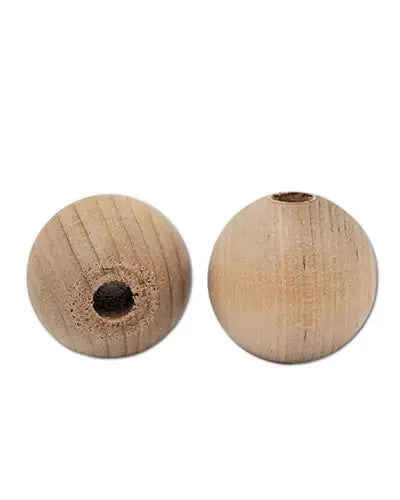 Close-up of a 1-1/2 inch round wood bead with a smooth finish and a 3/8 inch center hole, perfect for bird toy crafting.