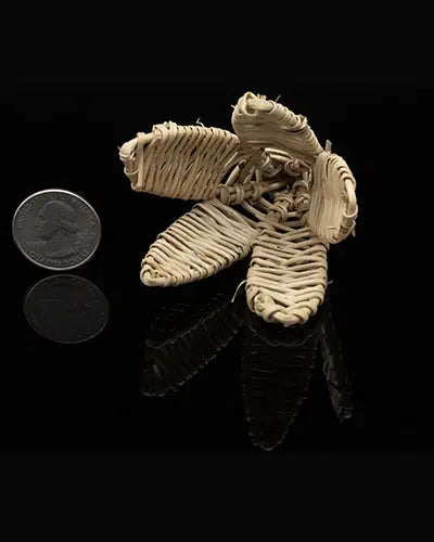 Delicate Vine Tulip toy part crafted from 100% natural materials, measuring about 6 inches long and 5 inches wide.