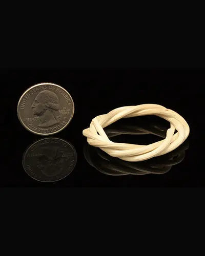 Vibrant, assorted colored vine rings in a 4-pack, crafted from 100% natural materials, perfect for bird toys, about 1.75 inches wide.