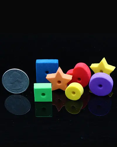 Colorful assortment of 20 foam shapes, perfect as plastic bird toy parts, in various sizes around 3/4 inch long and wide.
