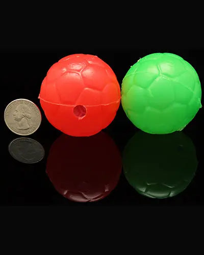 Vibrant plastic soccer balls in assorted colors, perfect as bird toy parts, measuring 2 inches in diameter with a small hole.