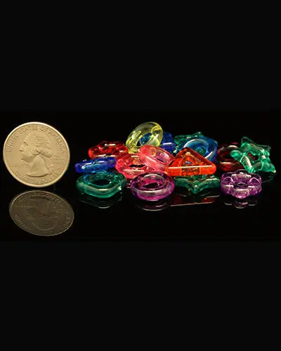 Vibrant mini plastic toy parts in assorted shapes and colors, perfect for bird toys, measuring 5/8" by 5/8" in a 12-pack.
