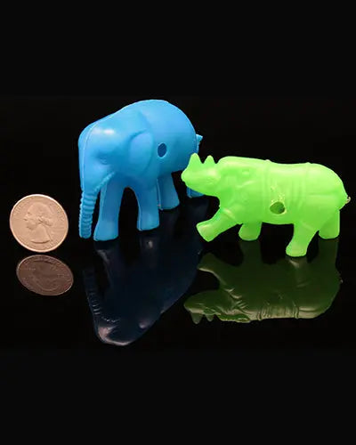 Colorful assortment of four plastic animal toys, including birds, each measuring 3 inches long, perfect for playtime fun.