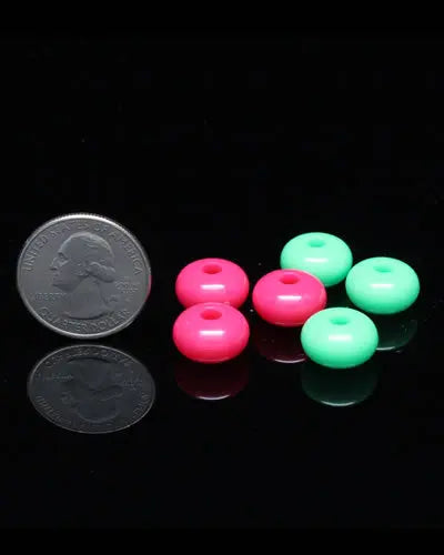 Vibrant assortment of XS Oval Beads in a 10-pack, showcasing colorful plastic bird toy parts with a small oval shape.