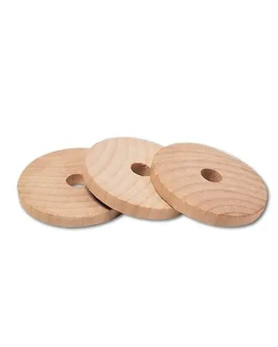 Close-up of six 2-inch natural wood discs, perfect as bird toy parts, showcasing their smooth texture and 3/8-inch center holes.