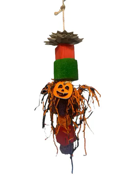 Colorful Happy Beaks Spooky Loofah bird toy with wooden blocks, vine balls, and crinkle paper on a sisal rope.