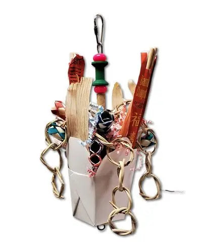Colorful Taky Outee Toy Jr. with corn husks, woven chains, and shredded paper spilling from a Chinese takeout box for birds.