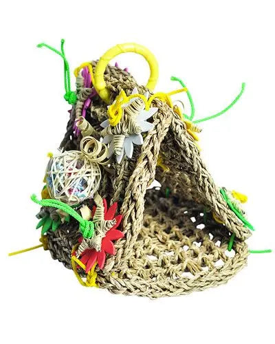 Cozy seagrass hut for birds with a canopy design, featuring colorful foam stars, wicker balls, and a swinging plastic ring.