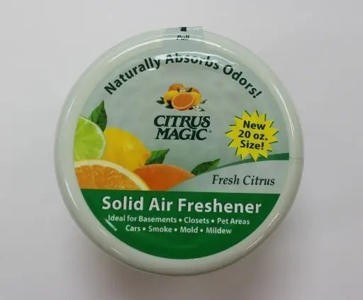 Bright yellow 20oz Citrus Magic Solid Air Freshener, exuding a fresh citrus scent for long-lasting odor control.