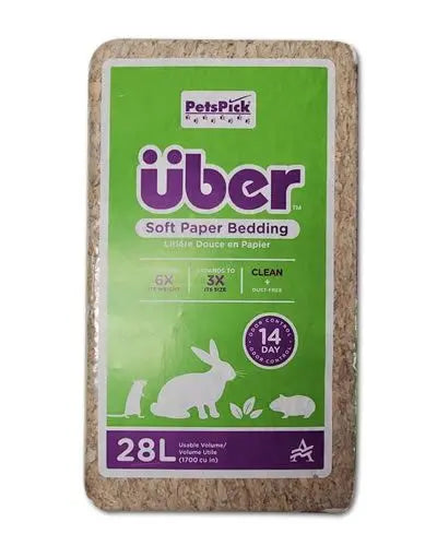 Soft, natural Uber 28 Liter Bedding in a fluffy pile, ideal for bird nesting with dust-free, odor-controlling comfort.
