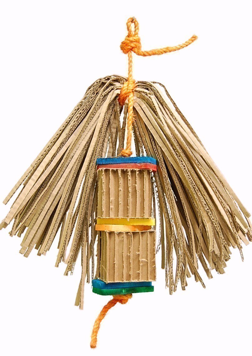 Colorful Pelluca-Zoo Max bird toy with paper shreds, accordion boxes, and wooden pieces for chewing and foraging fun.