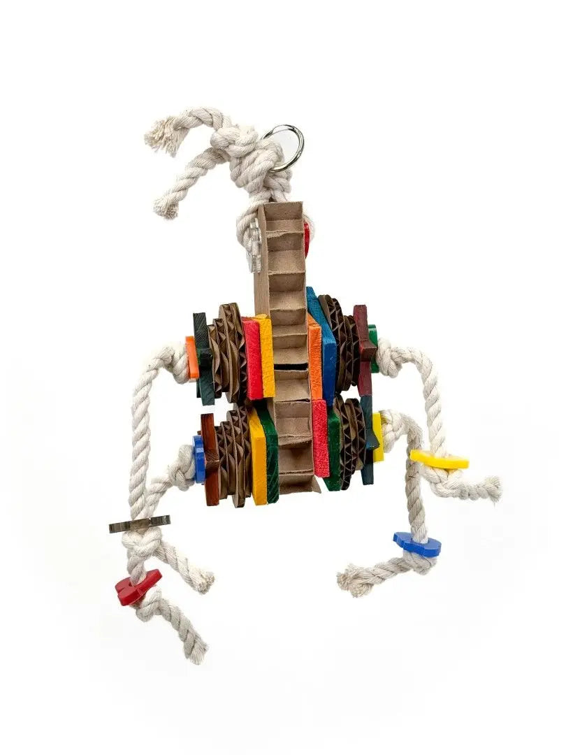 Colorful Gaspard Zoo Max bird toy with pine wood blocks, cardboard bits, and natural cotton rope for playful destruction.