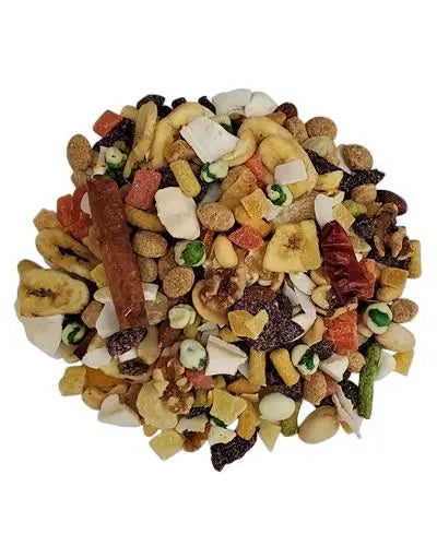 Vibrant mix of Grey/Eclectus Paradise Ultimate Blend with colorful pellets, nuts, dried fruits, hot peppers, and cinnamon sticks.