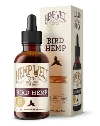Close-up of a 2oz bottle of Hemp Well Bird Hemp oil, featuring a vibrant label, designed to support bird health with natural omega fatty acids.