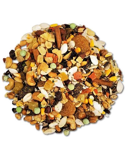Vibrant mix of Madagascar Island bird food with colorful fruits, nuts, and seeds like almonds, papaya, and sunflower kernels.
