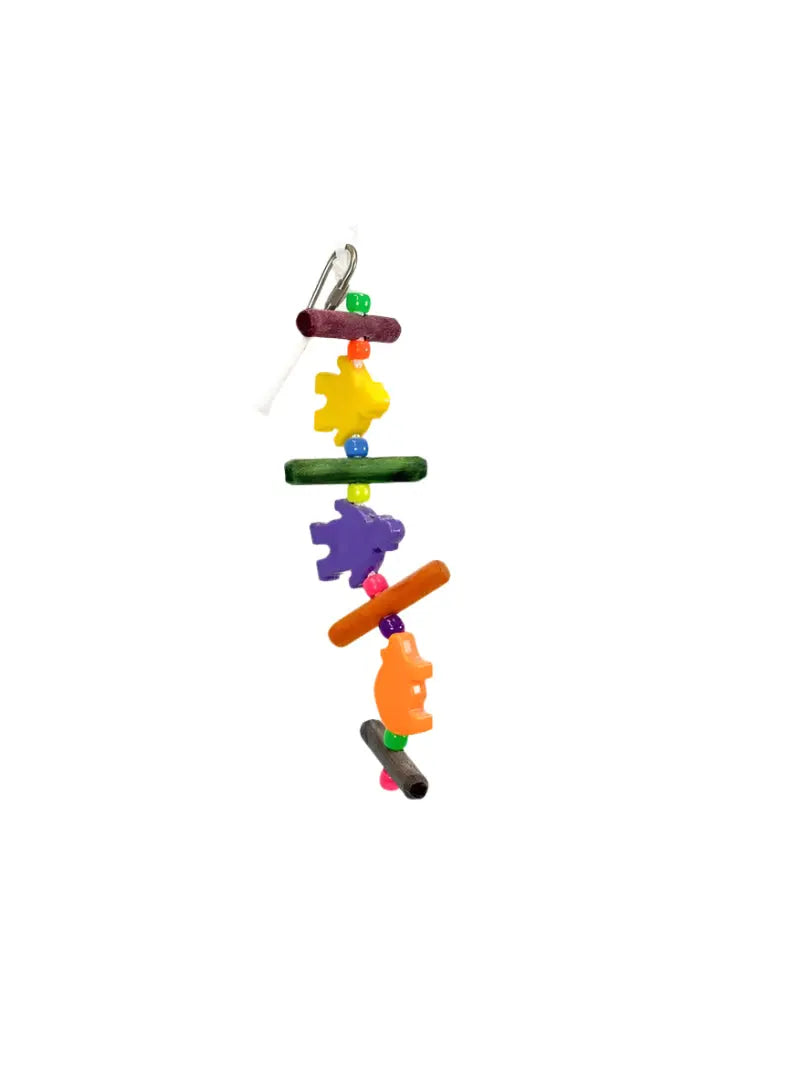 Vibrant Biquet Zoo Max parrot toy with yellow and purple puzzle pieces, wooden dowels, bright beads, and an orange head accent.