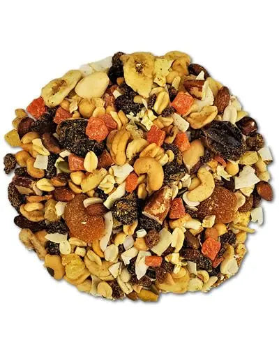 Vibrant mix of tree nuts and dried fruits like pecans, cranberries, and banana chips, showcasing a colorful, healthy snack.