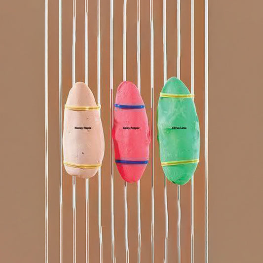 Three colorful cuttlebones in Honey Maple, Spicy Pepper, and Citrus Lime flavors, packed with essential calcium for birds.
