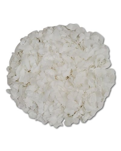 Crunchy coconut chips in a pile, perfect as a wholesome, tasty treat for birds with their natural, tropical appeal.