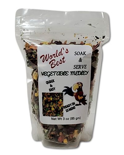 Vibrant mix of Soak & Serve Vegetable Medley by World's Best, showcasing colorful, natural bird food in a 3oz pack.