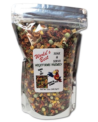 Vibrant 12oz pack of World's Best Soak & Serve Vegetable Medley, a colorful, all-natural bird food mix for all bird sizes.