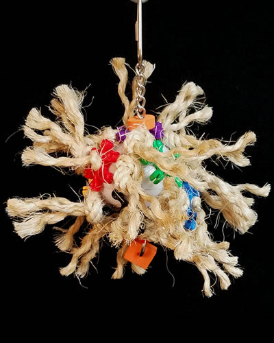 Vibrant Sisal Explosion bird toy with colorful sisal, plastic star links, and foam shapes knotted on a chained plastic ball.
