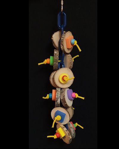 Vibrant bird toy with natural wood coins, colorful foam shapes, and plastic beads strung on poly rope and chain.