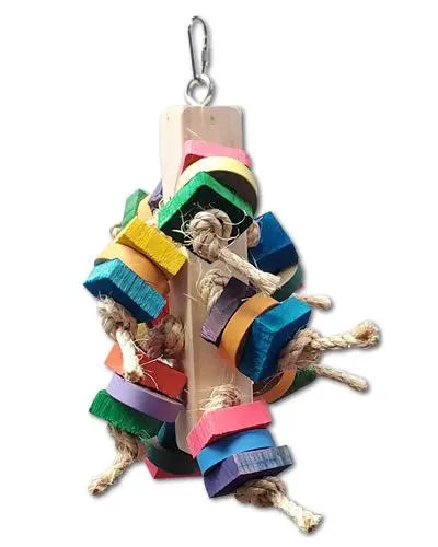 Vibrant bird toy with colored wood pieces and birdie bagels strung on sisal rope, hanging from a sturdy wooden block.