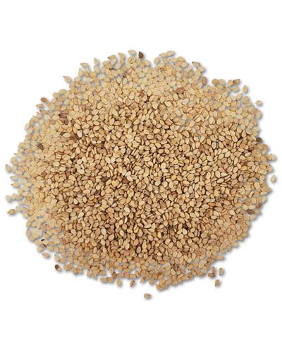 Close-up of 20lb hulled sesame seeds in bulk, showcasing their tiny, creamy-white texture, perfect for bird feed.