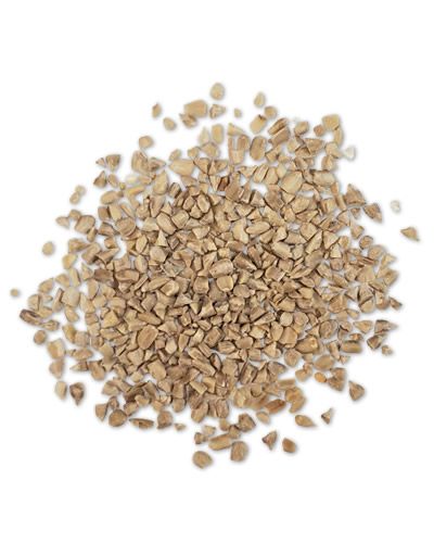 Close-up of 20lb bulk sunflower medium chips, showcasing their textured, golden-brown seeds for crafting or animal feed.
