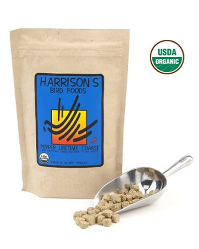 Vibrant mix of Harrison's Adult Lifetime Coarse Pepper bird food, featuring organic, spicy nuggets for large parrots.
