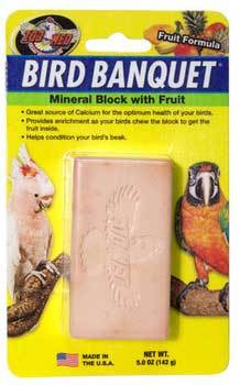 Vibrant Zoo Med Bird Banquet Mineral Block in fruit flavor, featuring tropical mango, banana, papaya, and pineapple hues.