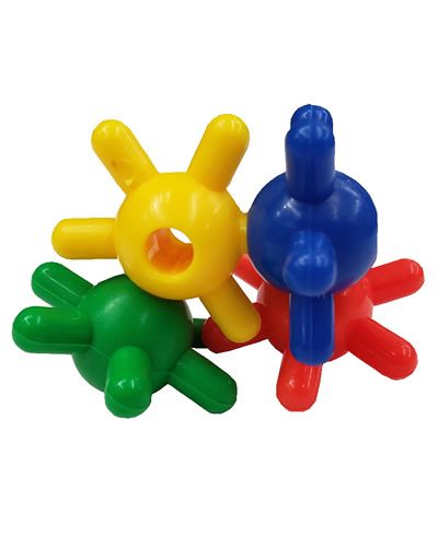 Vibrant plastic Alien Spaceship bird toy part in assorted colors, measuring 1.5 inches in diameter with a small center hole.
