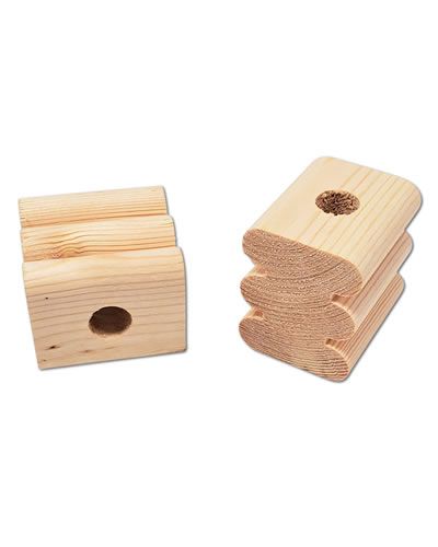 Close-up of a 1-3/4" natural wood block bird toy part with a large groove and a 1/2" hole, showcasing its textured surface.