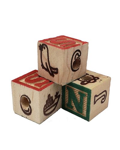 Vibrant 3/4-inch ABC blocks stacked neatly, showcasing colorful letters and numbers on a smooth wooden surface.