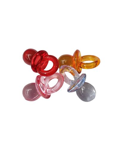 Colorful assortment of 10 XS acrylic pacifiers, small plastic bird toy parts measuring 3/4" long by 1/2" wide.