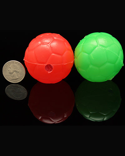 Vibrant plastic soccer balls in assorted colors, perfect as bird toy parts, measuring 2 inches in diameter with a small hole.