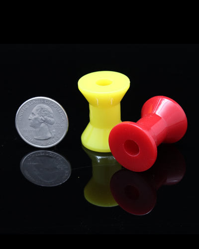 Vibrant small acrylic spool in assorted colors, perfect as a bird toy part, measuring 1-3/16" long with a 5/16" hole.