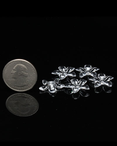 Vibrant assortment of clear flower beads in a 15-pack, showcasing colorful plastic designs for bird toys, about 11/16" wide.