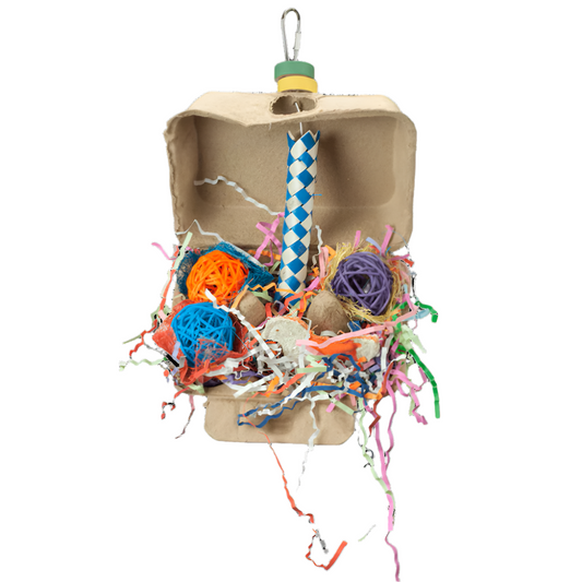 Colorful bird toy with cardboard base and various materials on a white background